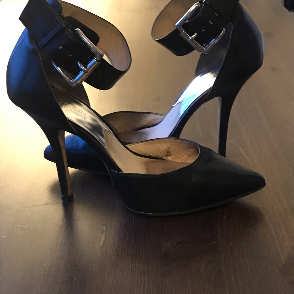 Black leather pumps with ankle strap